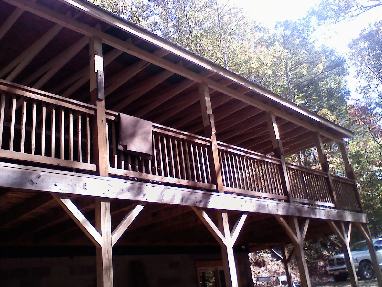 Timber framing under a new elevated porch and deck — Roof Leak Repair in Islandton by Roofing Brothers